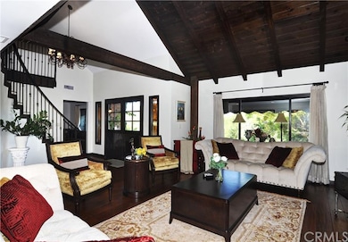 Dramatic Formal Living Room with Cathedral Open Be