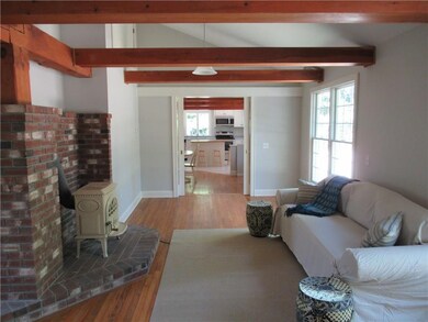 Living room is L-shaped. This...