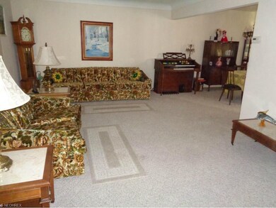 *LIVING ROOM BOASTS OPEN FLOOR PLAN DESIGN*