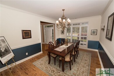Formal dining room with judges panel trim and plan