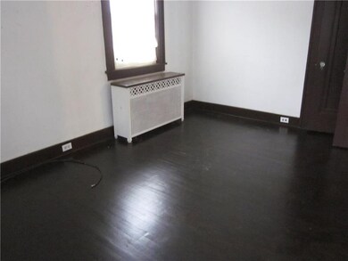 Bedroom with re finished hard wood flooring