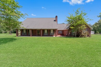 This home has a spacious front porch, two car gara
