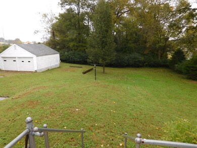 Huge backyard with detached 2 car garage.