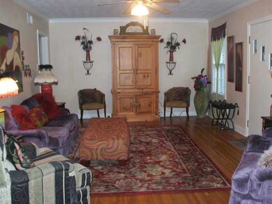Hardwood floors throughout, painted in neutral col