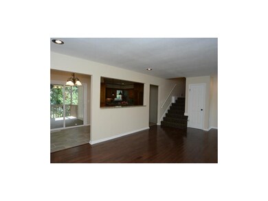 Hardwood floors in the living room with recessed l