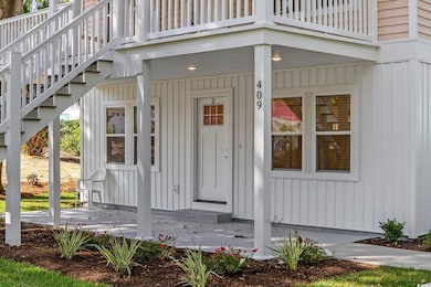 Entrance to property with covered porch