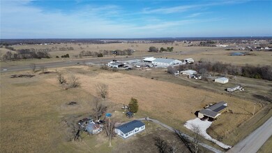 FRONT PORTION OF A LARGER TRACT FRONTAGE ON 412 -