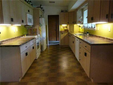 Kitchen. The kitchen has been updated with birch c