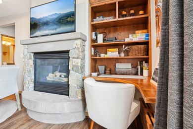 Living room featuring wood finished floors and a f