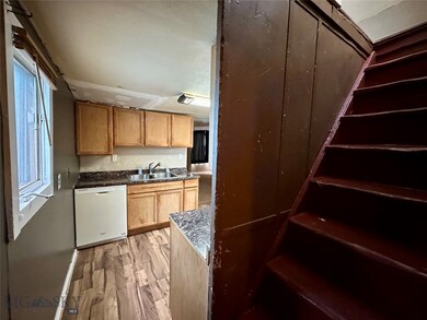 Kitchen and stairway to bedroom