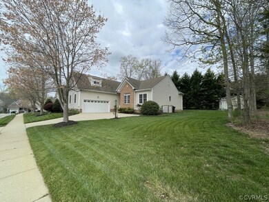 View of front of property with a front lawn