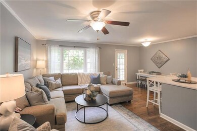 Open floor plan with gorgeous wood floors