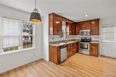 Large Dining Area with Rear View of Backyard