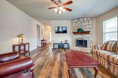 Living room with hardwood / wood-style flooring, c