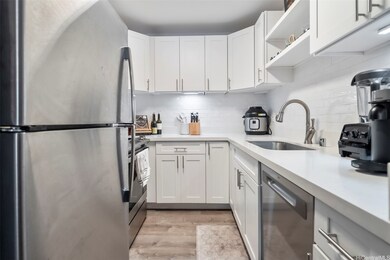 The kitchen is equipped with new appliances throug
