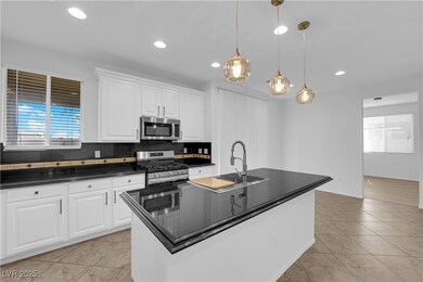 Kitchen with stainless steel appliances, plenty of