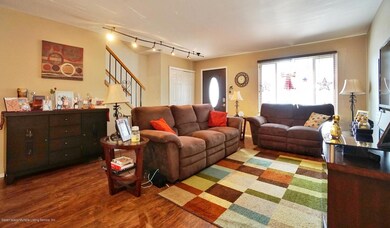 (2) Living Room and Foyer with Coat Clos
