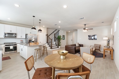 This first floor, open concept living area is comp