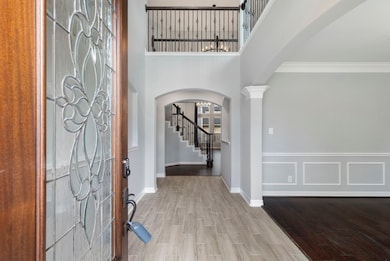 Front entry with high ceilings.