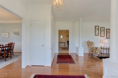 Spacious foyer with stunning hardwood floors!