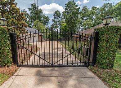 Undamaged gated entrance (photo was prior to fire)