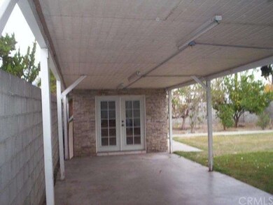 COVERED PATIO TO PLAY ROOM IN BACK YARD