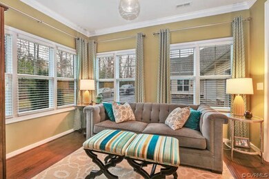 Cozy up with a good book in this bright Sunroom!