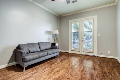 1st fllor bedroom with french doors leading into t