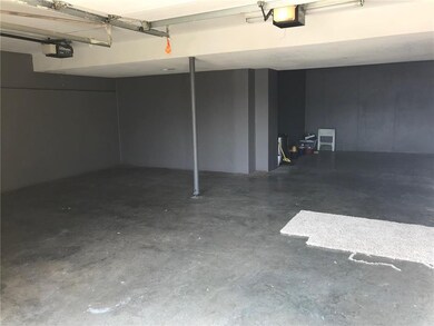 Front view into large deep garage.