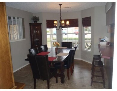 Dining Room. The bay window in the dining room fac