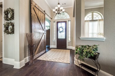 Oversized barn door that leads to the office.