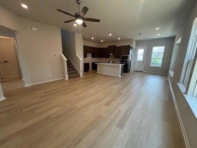 Unfurnished living room with stairway, a ceiling 