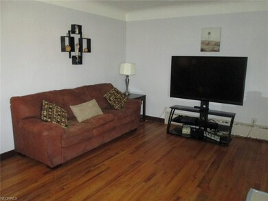 Living room with hardwood floors.