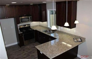 Convenient bar counter with pendulum lights; reces