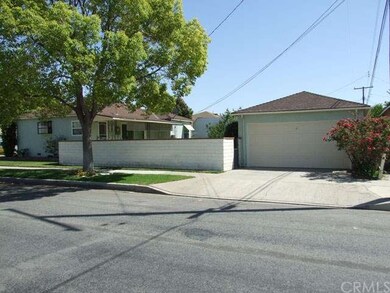 Double Detached Garage with Concrete Driveway