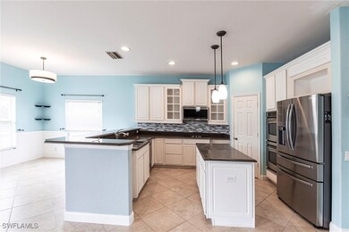 Kitchen with stainless steel appliances, plenty of