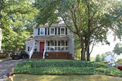 Nice landscaping adds to the curb appeal of this h
