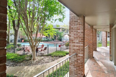 View of the pool from the balcony walkway in front
