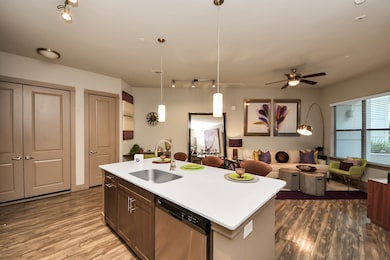 Photos are not of actual units, similar floor plan finishes, verify dimensions