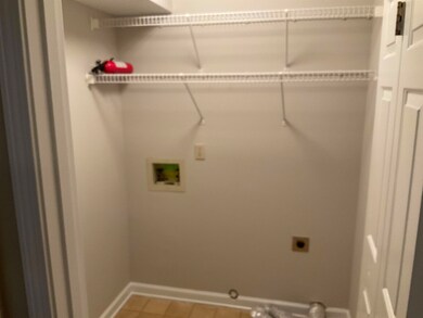 Laundry area with laundry area, baseboards, gas dr