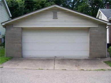 Exterior Front. Spacious 2 car garage