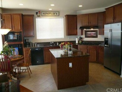 Kitchen and dinette with tile floors.