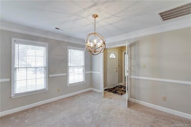 Formal Dining Room With New Lighting, New Carpet &