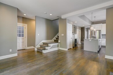 562_S_6th_33_of_33_Great room to stairs