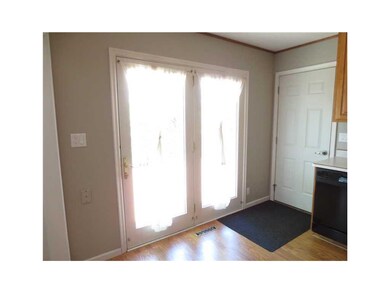 Kitchen. Doors to large backyard deck.