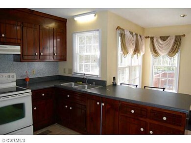 Kitchen - Roomy kitchen features ceramic tile floo
