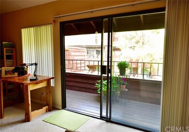 SLIDING DOORS TO THE BALCONY WITH THE STORAGE AREA