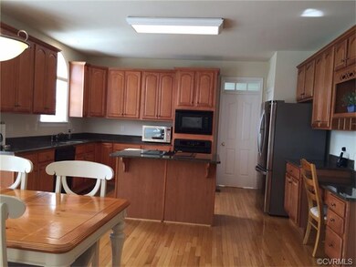 custom Eat-in Kitchen leading to Formal Dining Roo