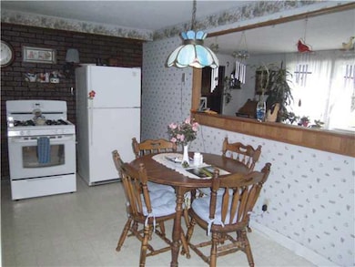 Kitchen. The eat in kitchen is open to Living room