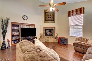 LIVING RM WITH BUILT-IN AND FIREPLACE